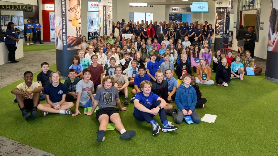 Group of students and volunteers from US Bank in BizTown during October 2024